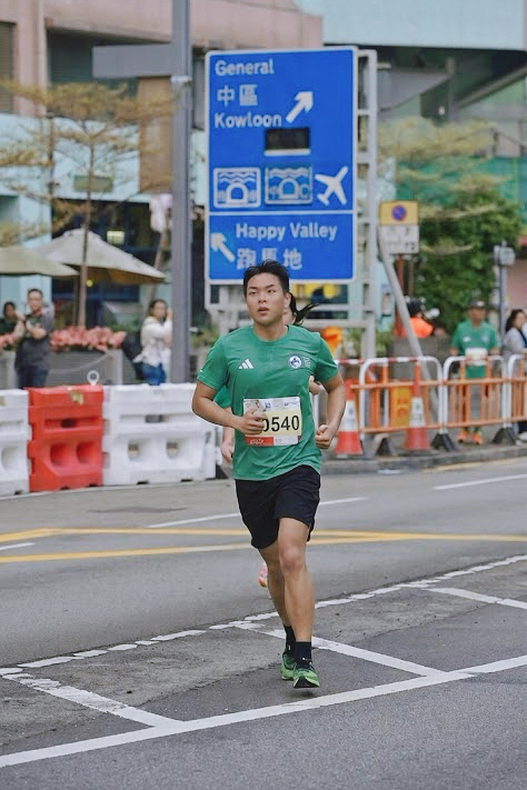 Oliver running in a race