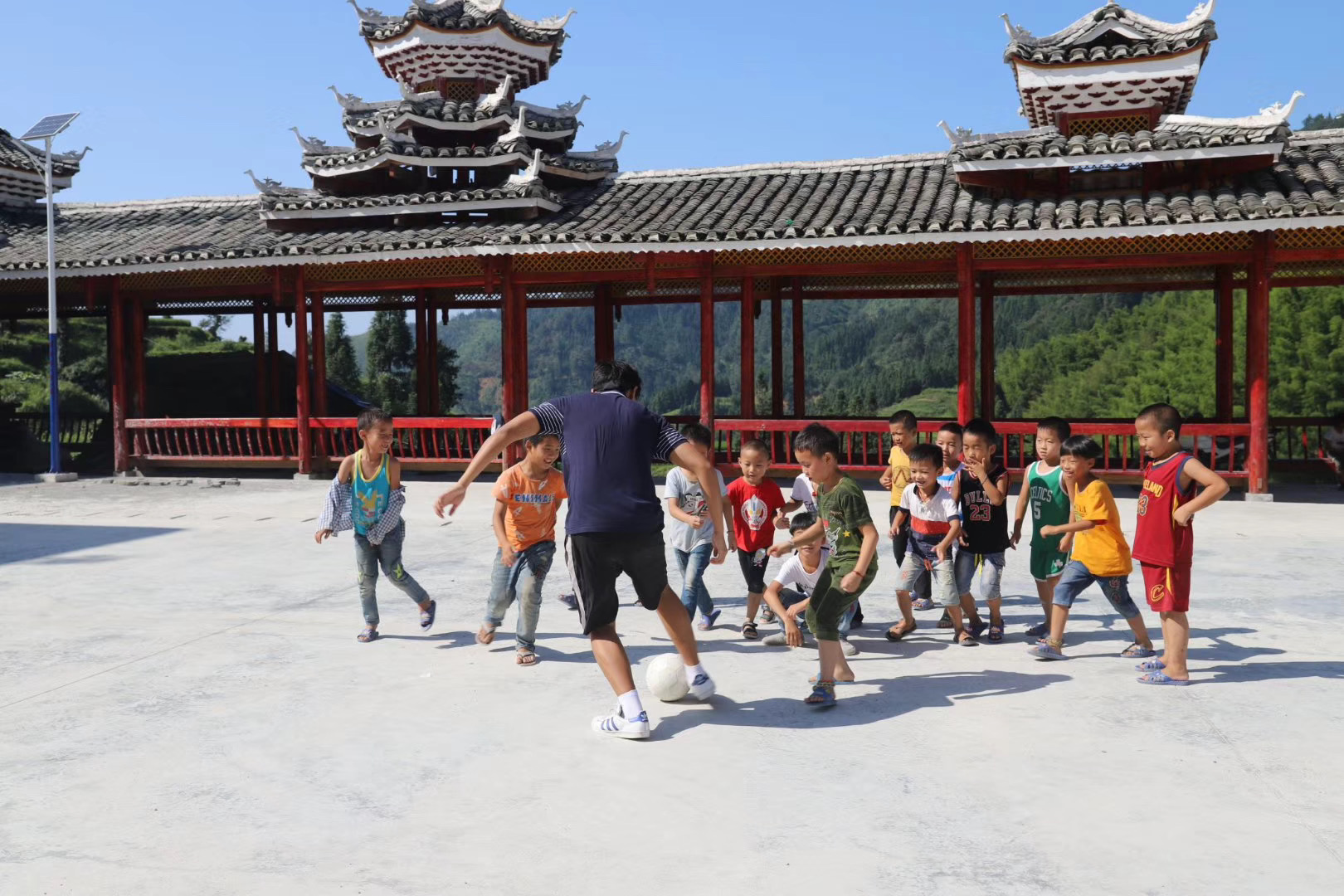 Outdoor activity with children during volunteer teaching